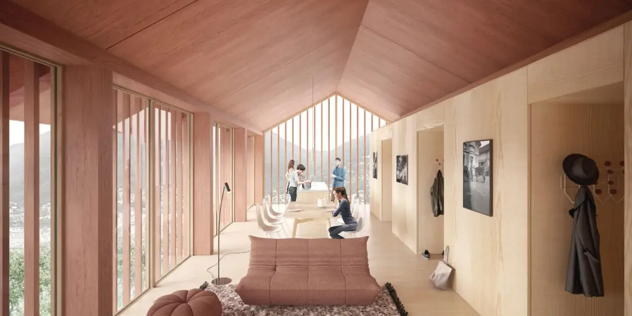Intérieur lumineux d'un logement étudiant suisse en bois, avec vue sur les montagnes. Un espace convivial pour étudier et se détendre.